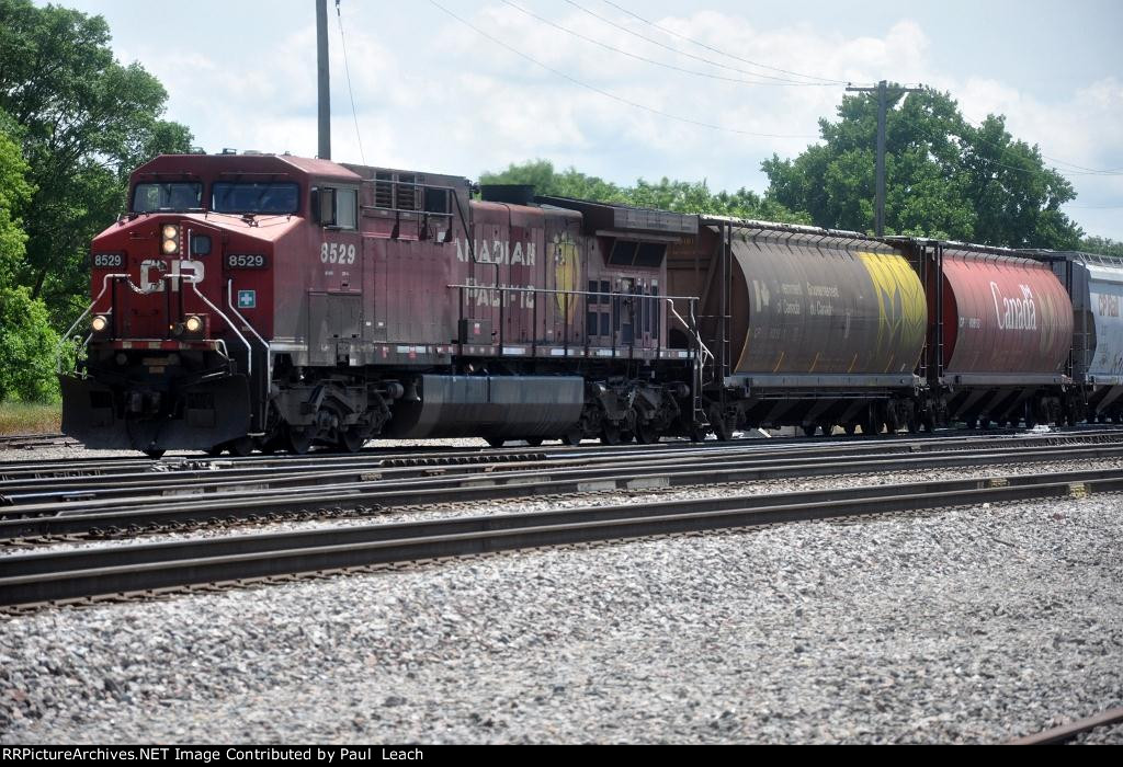 Westbound grain train hits the connection